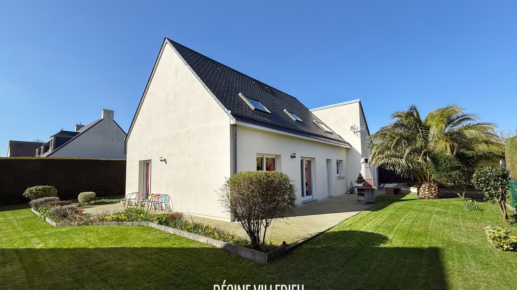 Maison avec garage et jardin dans un quartier très calme